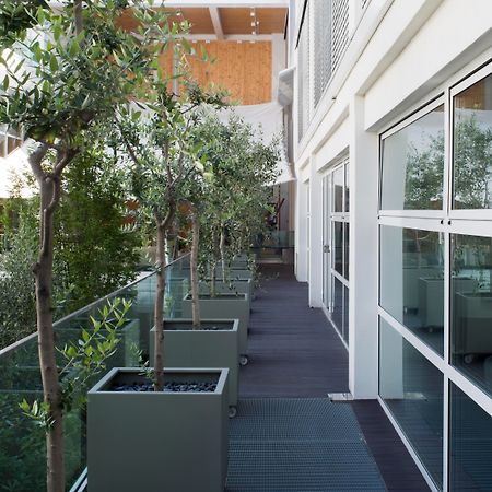 มัญญา ปาร์ โลเตล อา ปาร์ฟูม Hotel มิลาน ภายนอก รูปภาพ The interior of the building