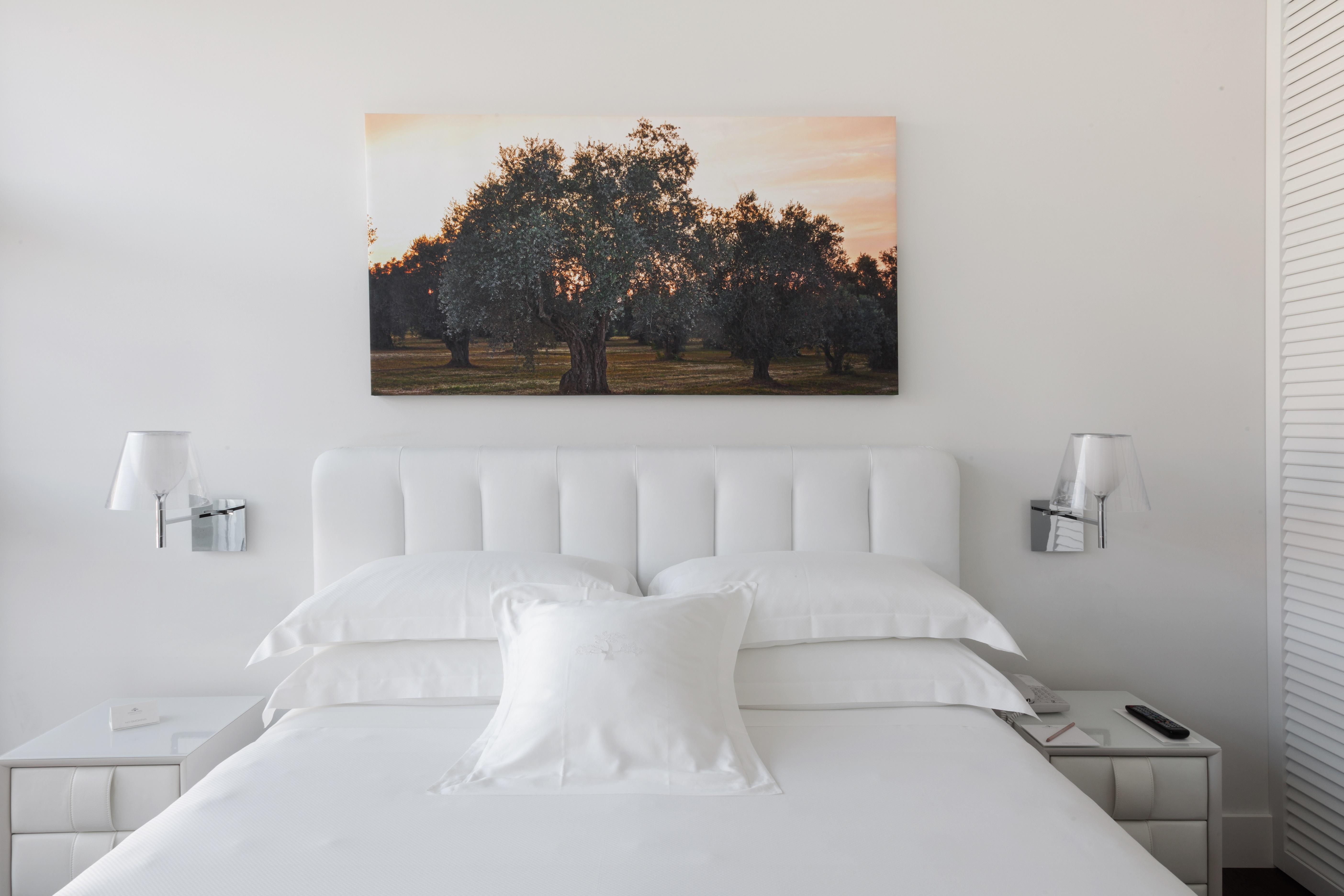 มัญญา ปาร์ โลเตล อา ปาร์ฟูม Hotel มิลาน ภายนอก รูปภาพ A bedroom at the Hotel Indigo