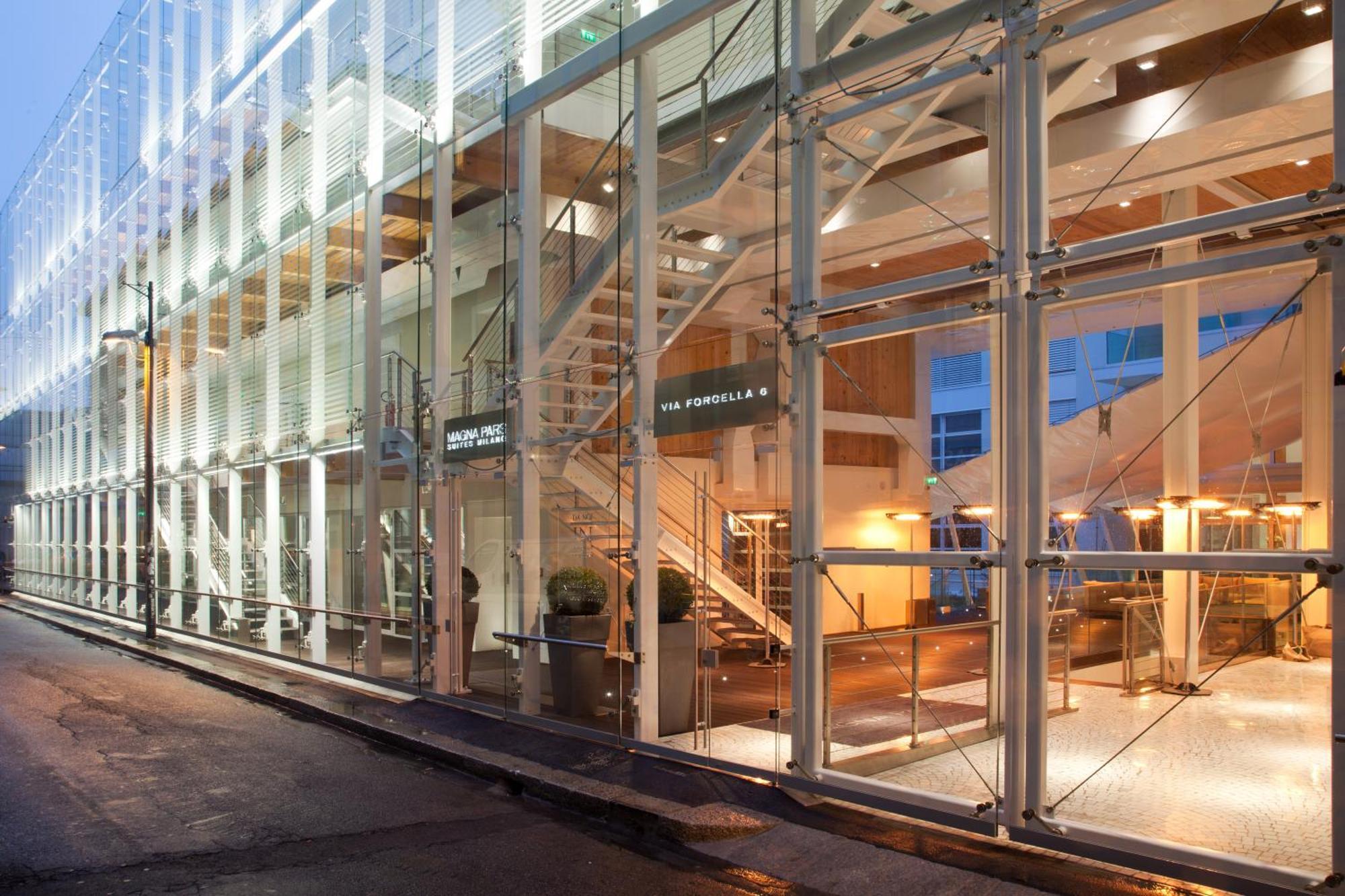 มัญญา ปาร์ โลเตล อา ปาร์ฟูม Hotel มิลาน ภายนอก รูปภาพ The new library building