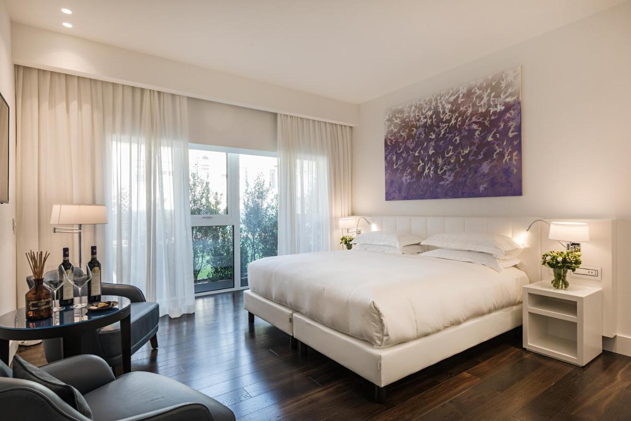มัญญา ปาร์ โลเตล อา ปาร์ฟูม Hotel มิลาน ภายนอก รูปภาพ Deluxe room